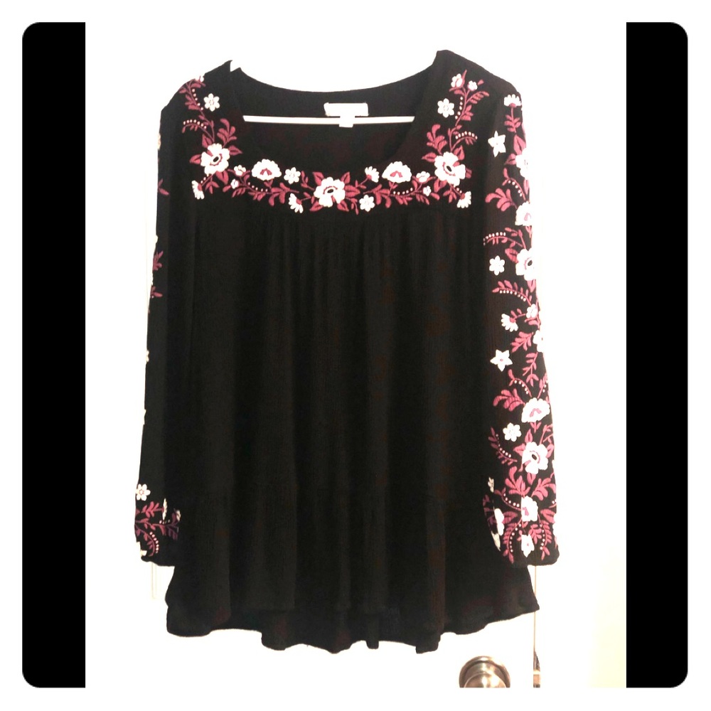 Black top with pink and white floral detail
